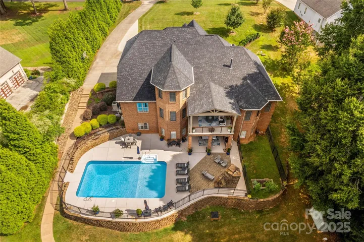 View of Home and Pool, on Private Waterfront Lot