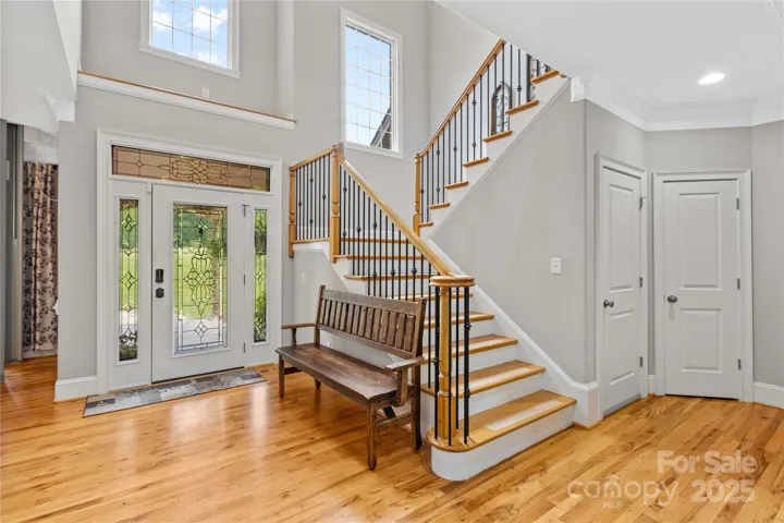 Light and Open Foyer, real Hardwoods