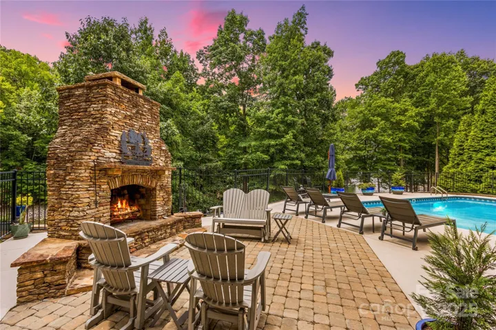 Fireplace and several seating areas, Poolside