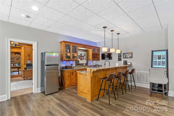 Bar features a sink, Drink Cooler