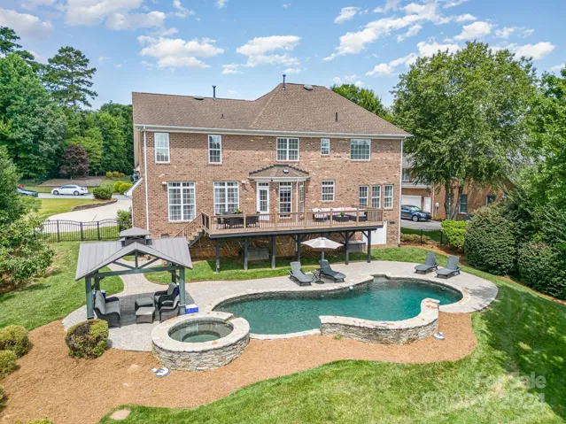 Back yard oasis! deck, gazebo, pool, hot tub all privately overlooking the lake!