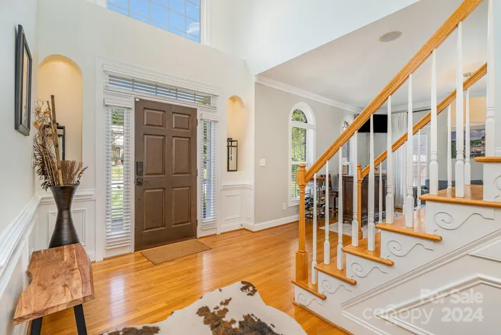The foyer opens to the formal living area.
