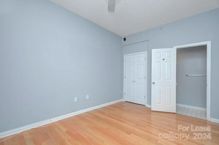 Flex bedroom with laundry room and half bathroom