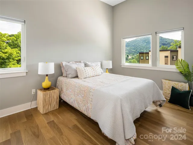 One of two other bedrooms on the third level. Pull down the Levolor shades for privacy