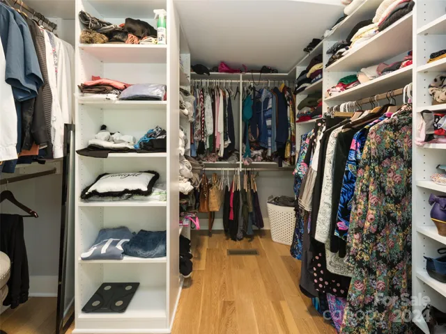 The large walk-in closet in the primary suite