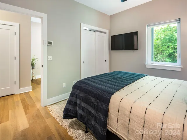 The en-suite main level bedroom can also double as a work space