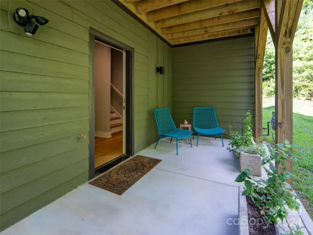 The main level patio is protected by the water proofed upper porch system