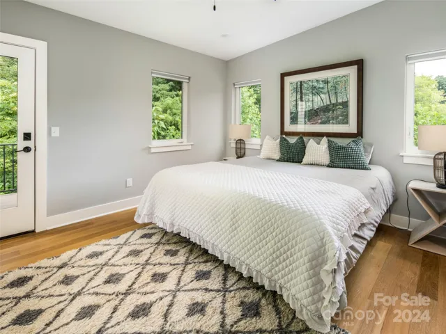 Take the stairs or elevator up to where three of the four bedrooms can be found