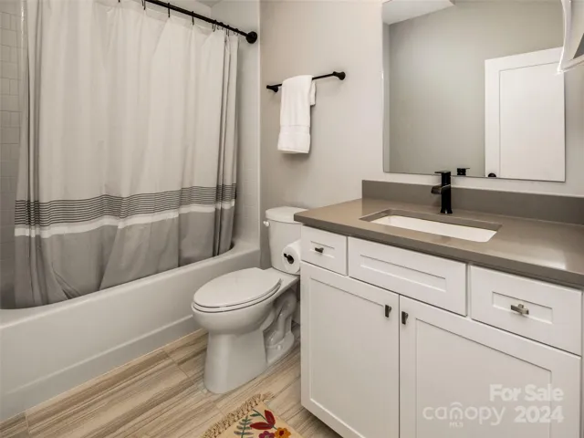 The shared bathroom on the third level