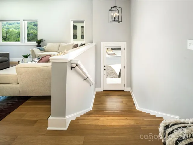 The entry way from the stairs. The other options include the internal staircase and the elevator