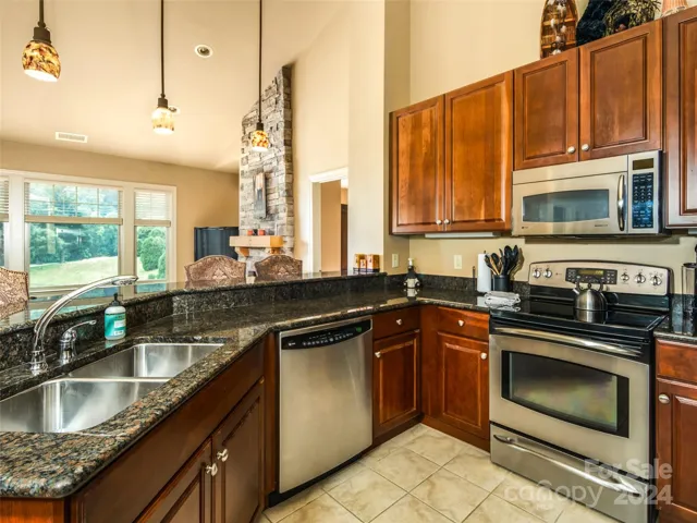 stainless appliances, solid cabinetry, stone countertops