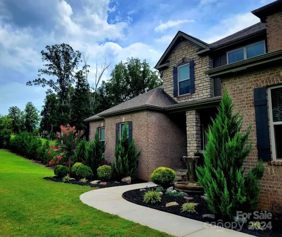 Beautifully, landscaped double lot. WELCOME HOME!