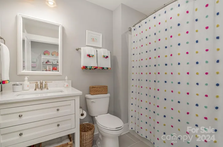 Large full bath upstairs with easy access from the bonus room OR the bedroom