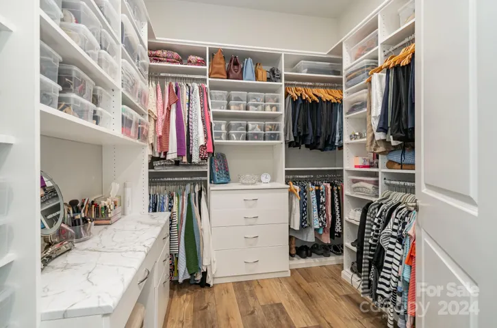 Custom closets in the primary - this is one side. There is a distinct second closet too