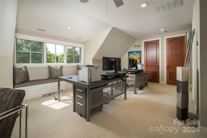 Bonus Room and Office includes custom closets and electronics closet