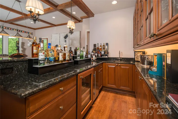 Wet bar, copper sink, sub-zero wine refrigerator