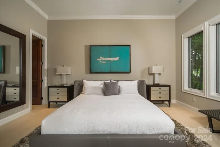 Guest Room #1 with custom walk in closet, access to deck