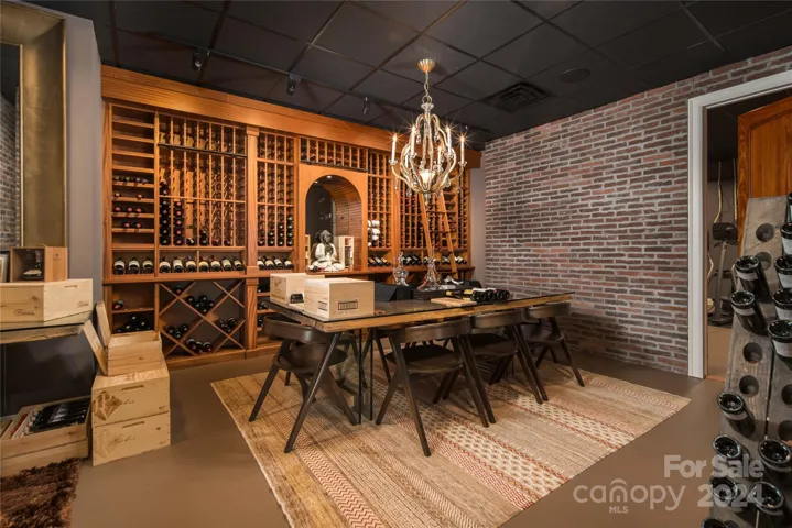 WINE CELLAR! Separate AC, storage room with extra refrigerator