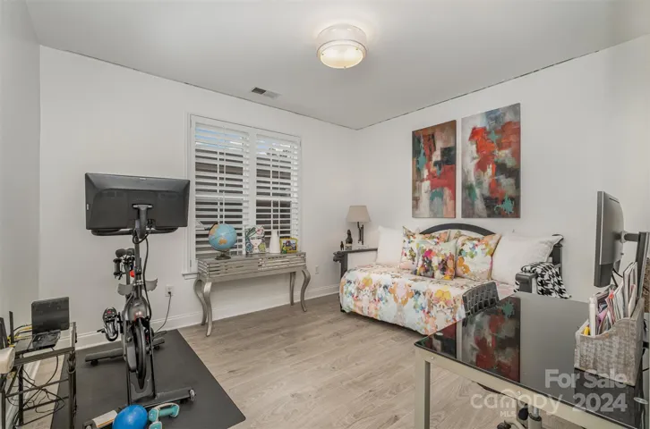 Secondary bedroom  large enough to double as an office or fitness center