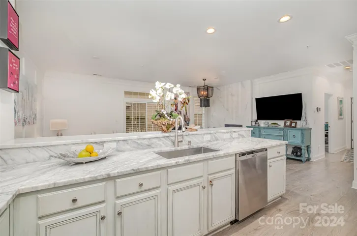 Kitchen overlooks family area