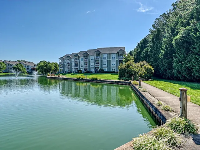 A walk along community pond overlooking Lake Norman