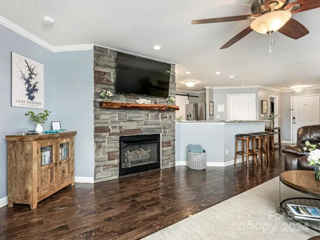 Stone fireplace w/ live edge mantle