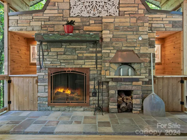 Enjoy The Outdoor Wood Burning Fireplace And EarthStone Pizza Oven