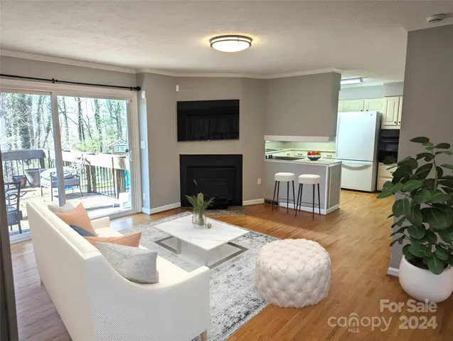 Virtually staged den or potential dining room area