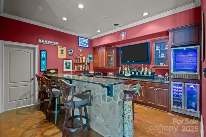 Bar with beverage fridge, dishwasher, sink