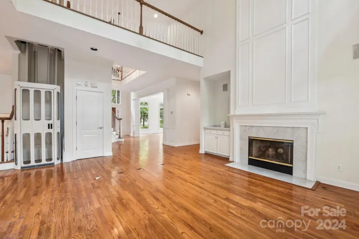 Elevator. Could easily be turned back into a split staircase.