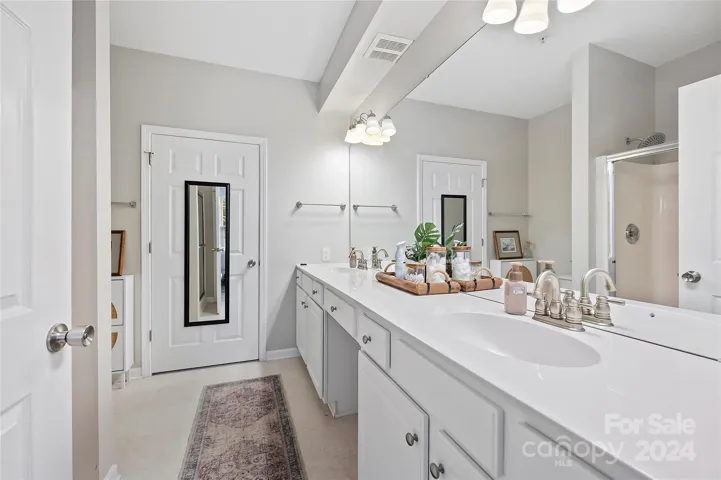 Primary bath with dual vanity