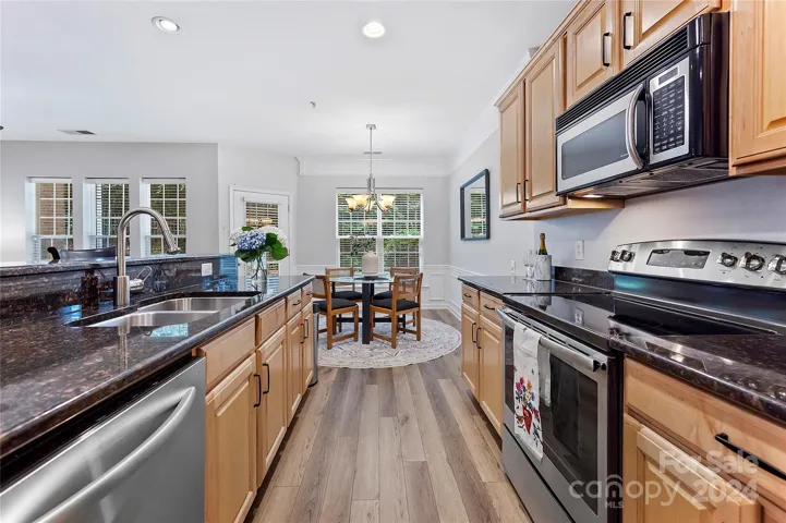Kitchen with stainless appliances and granite countertops