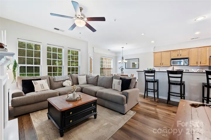 Large windows overlook private patio