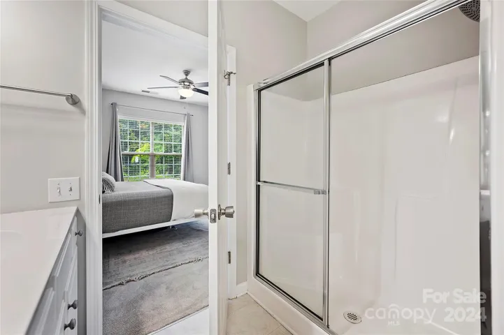 Primary bath has walk in closet