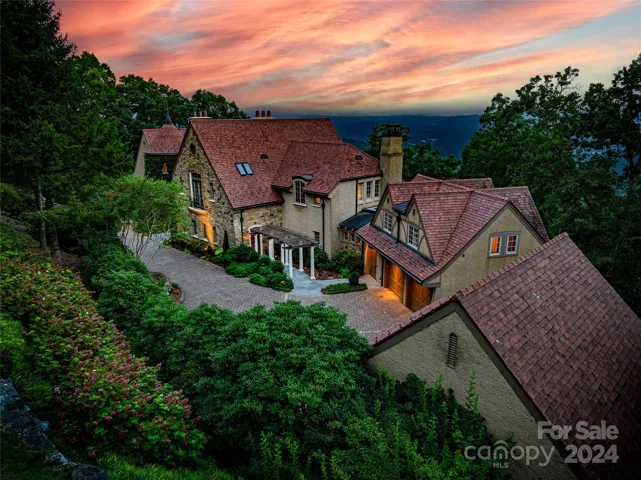 The home sits on top of the mountain with views of the mountains