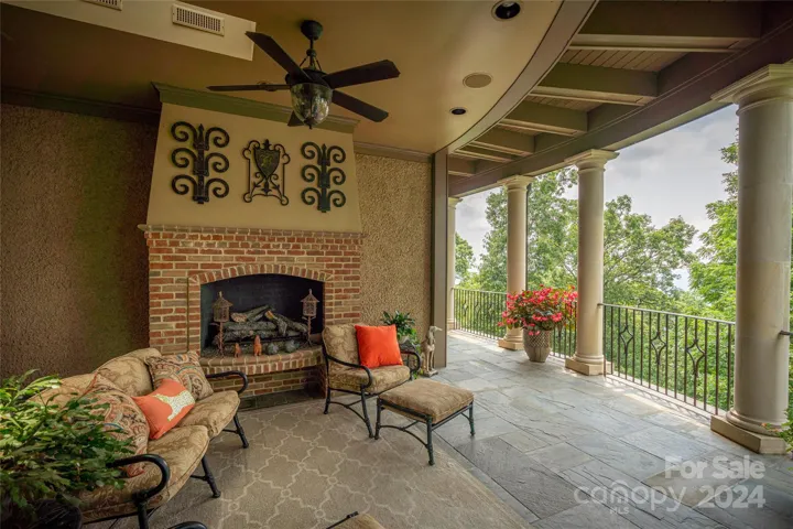 Outdoor Living space with balcony and fireplace