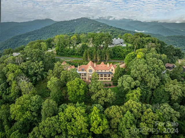 Home is 15 minutes from Asheville overseeing the Blue Ridge Mountains