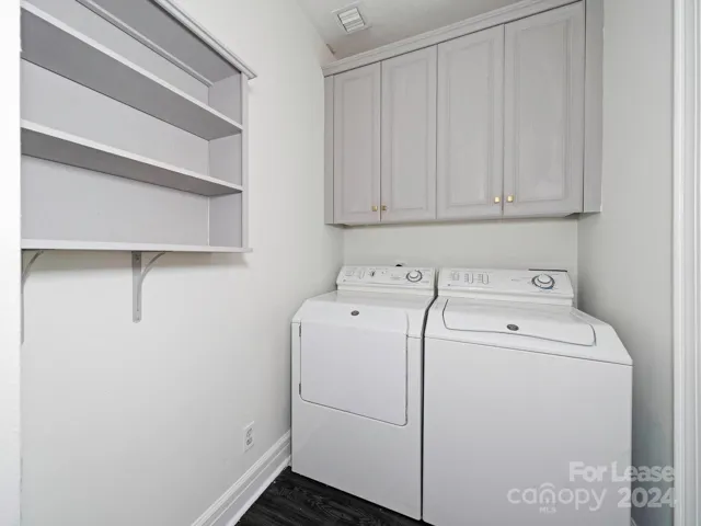 Laundry room with tons of storage and additional kick out space