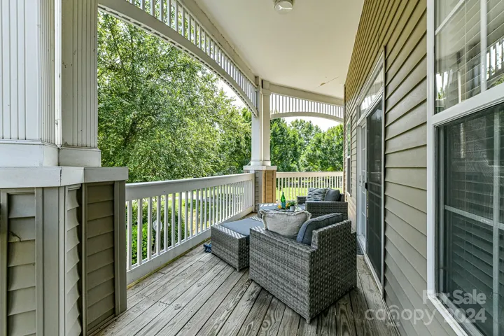 Huge, Wrap Around, Covered Porch perfect for relaxing & enjoying the beautiful mature trees & landscaping!