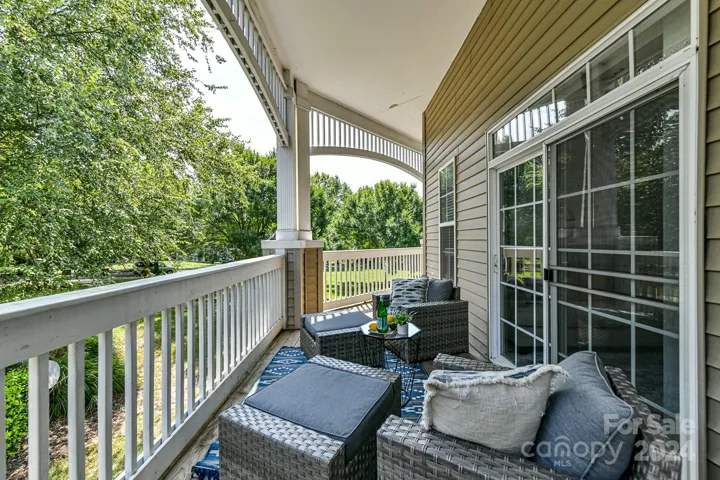 Huge, Wrap Around, Covered Porch perfect for relaxing & enjoying the beautiful mature trees & landscaping!