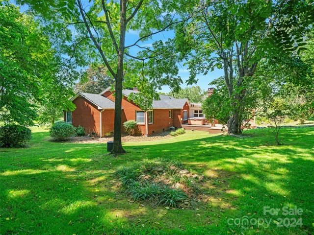 Spacious flat yard on over half an acre