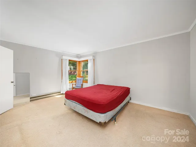 Spacious Bedroom with large corner windows