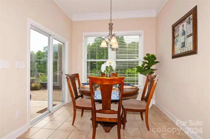 Breakfast Room with sliding glass door opens to covered patio
