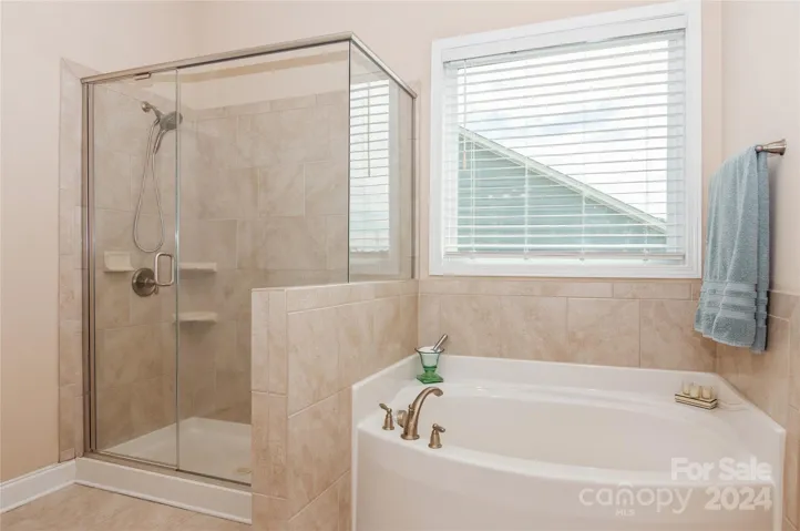 Primary Bathroom with Garden Tub and Separate Shower