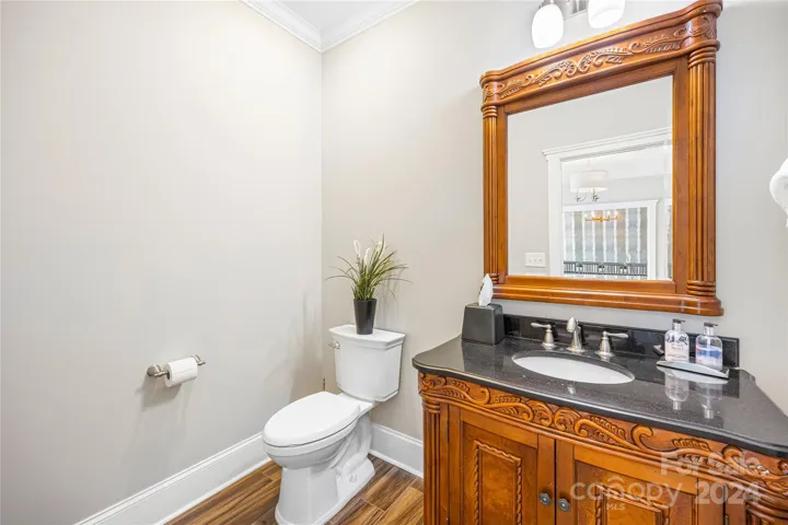 Powder room off entrance foyer