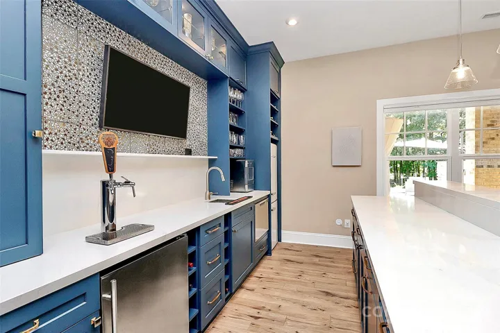 Entertainers dream in this stunning bar in the walk out lower level.