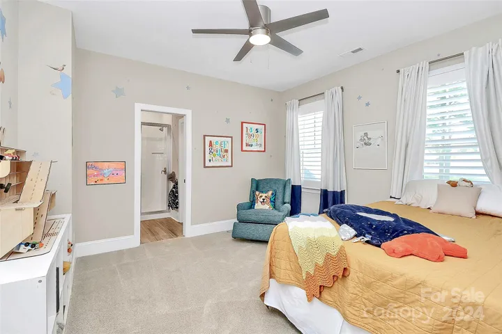 Upstairs bedroom with walk in closet and en suite.