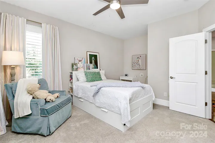 Upstairs bedroom with walk in closet and en suite.