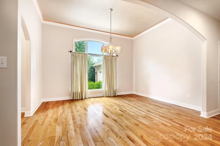 Formal Dinning with coffin ceilings/ Archway