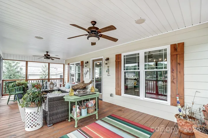 Screened in back porch with year round water views.